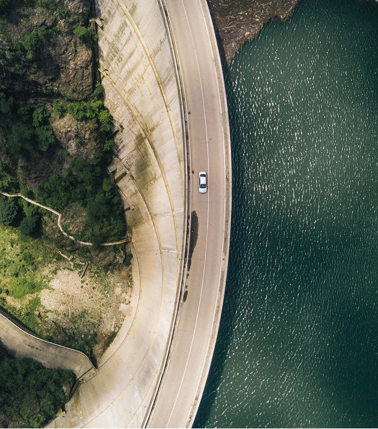 Aerial view of a hydroelectric dam and reservoir